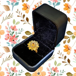 Sunlit Petals – Elegant Gold-Plated Floral Ring with Red Accent